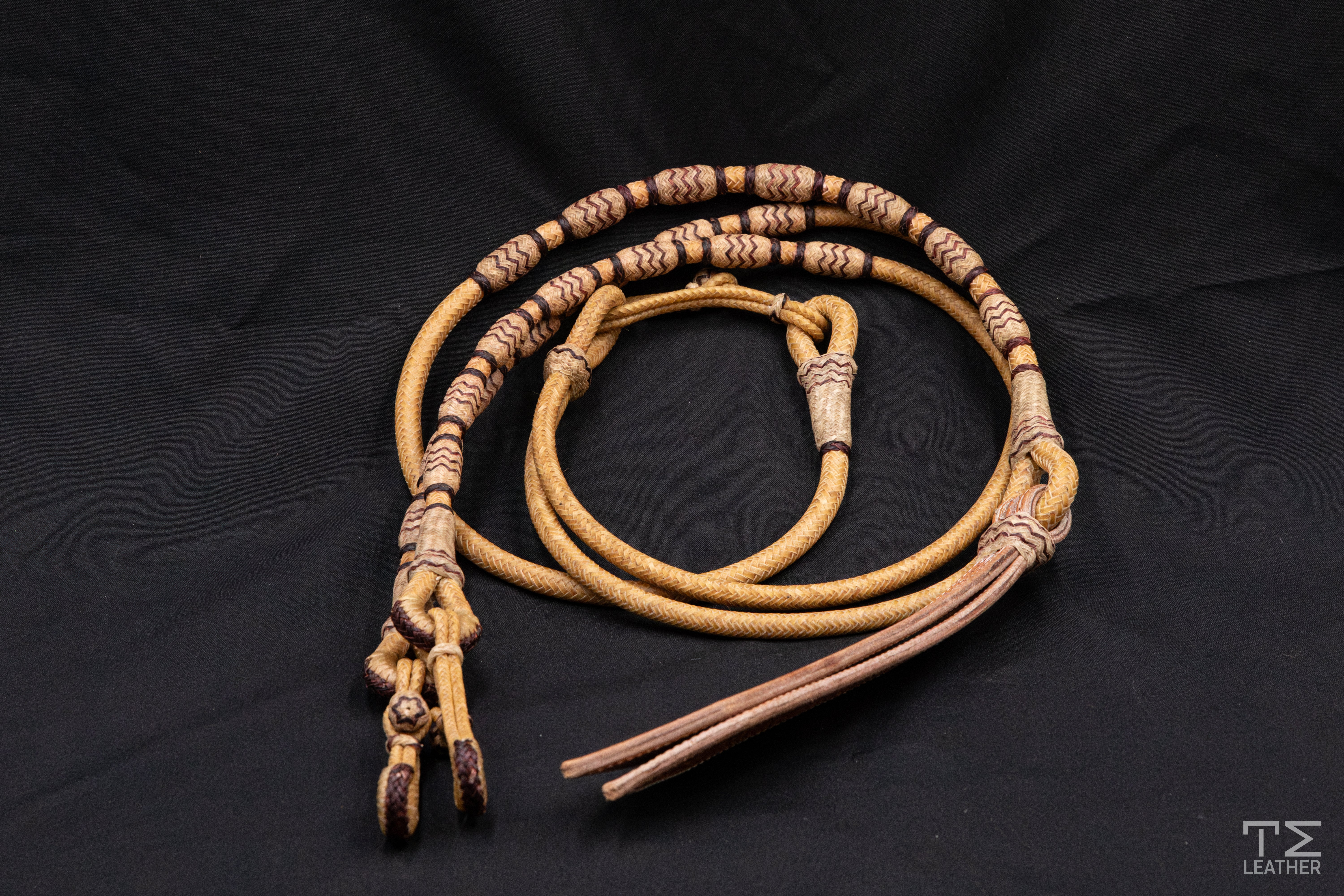 Calvin Hochstrat 7/16" Natural Rawhide w/ Maroon Accents 16 Plait 92"